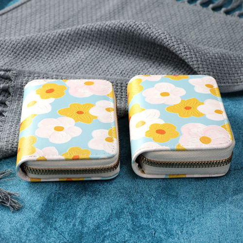 Compact women's card holder with multiple slots, large capacity, stylish design—perfect for holding your driver’s license and coins in one sleek, adorable package.