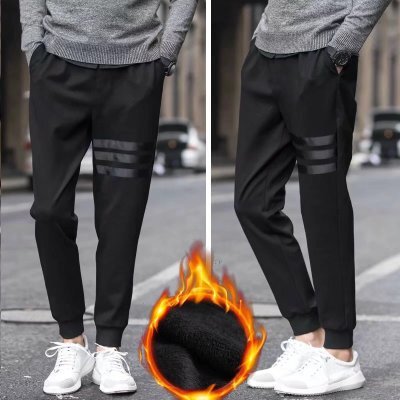 Autumn and winter trendy men's velvet thickened casual pants cheap labor protection pure black work pants