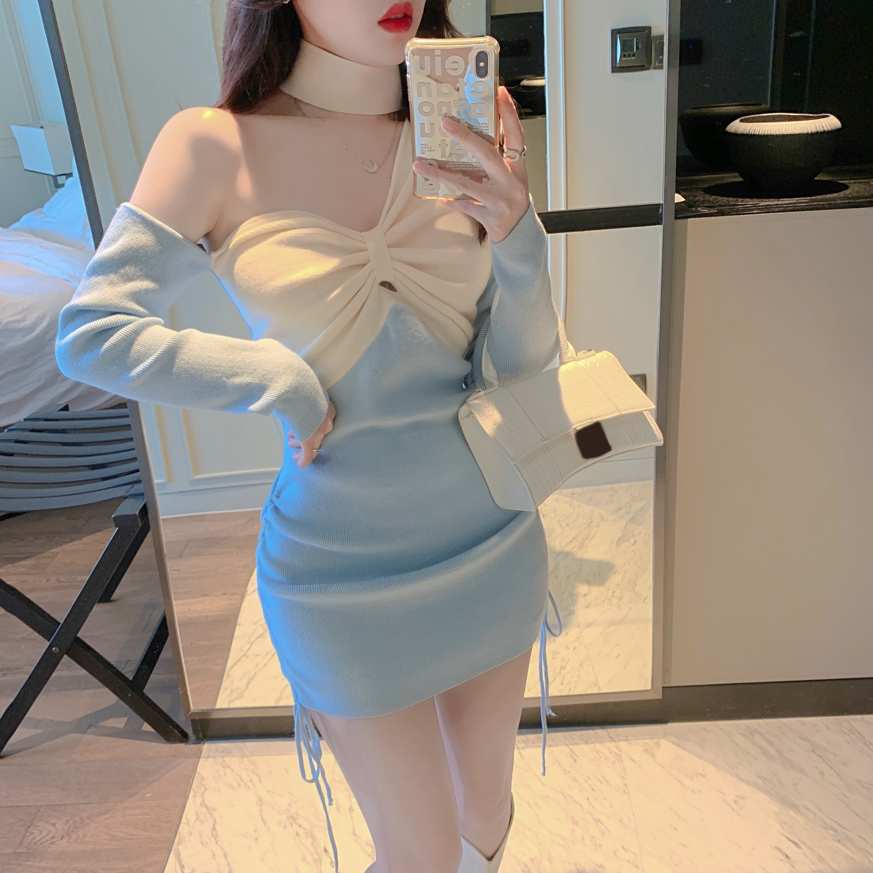 Knitted dress women's 2021 winter new celebrity temperament design sense off shoulder slim Hip Wrap Skirt