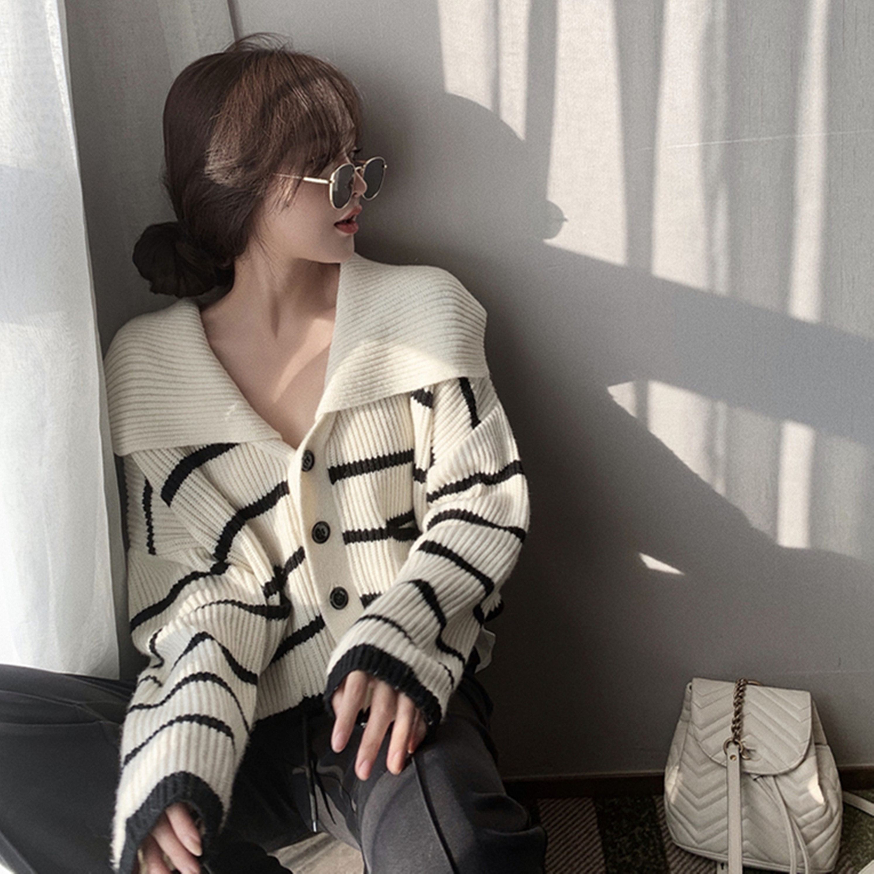 Gentle wind stripe knitted cardigan women's autumn and winter 2021 new French loose outer Lapel sweater versatile top