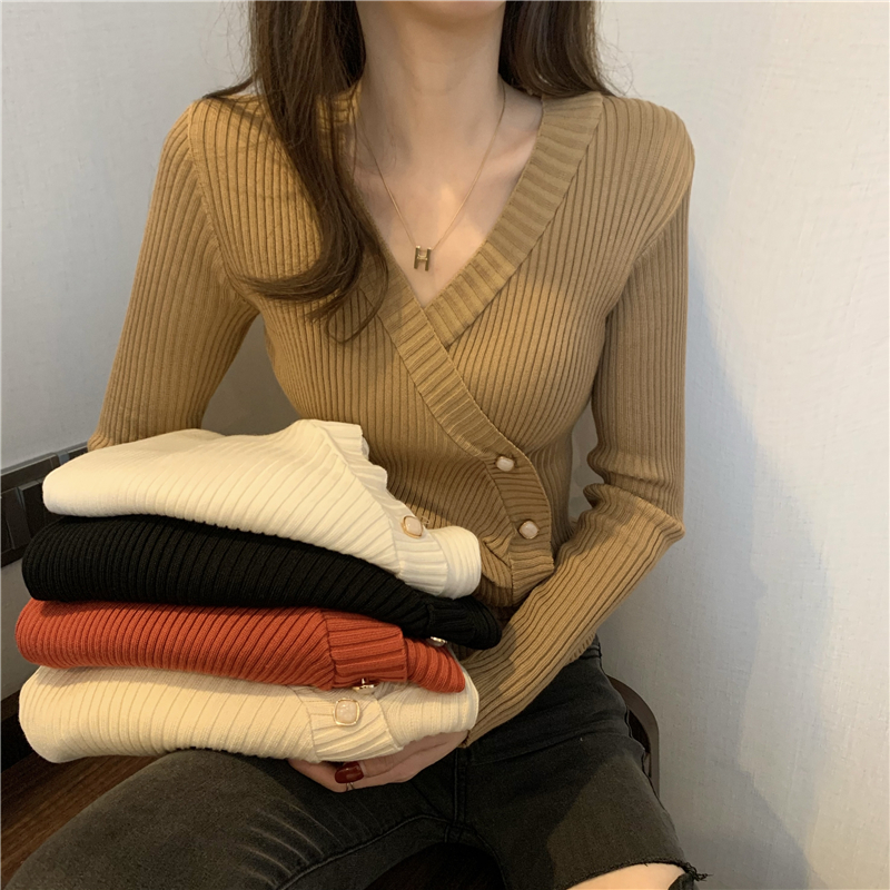Autumn and winter button irregular long sleeve sweater women's 2021 new Korean design V-neck bottomed Shirt Top
