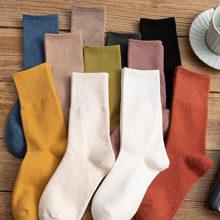 Women's mid-calf Korean version ins autumn and winter style pile socks Japanese mid-calf socks women's solid color double-needle socks trendy socks
